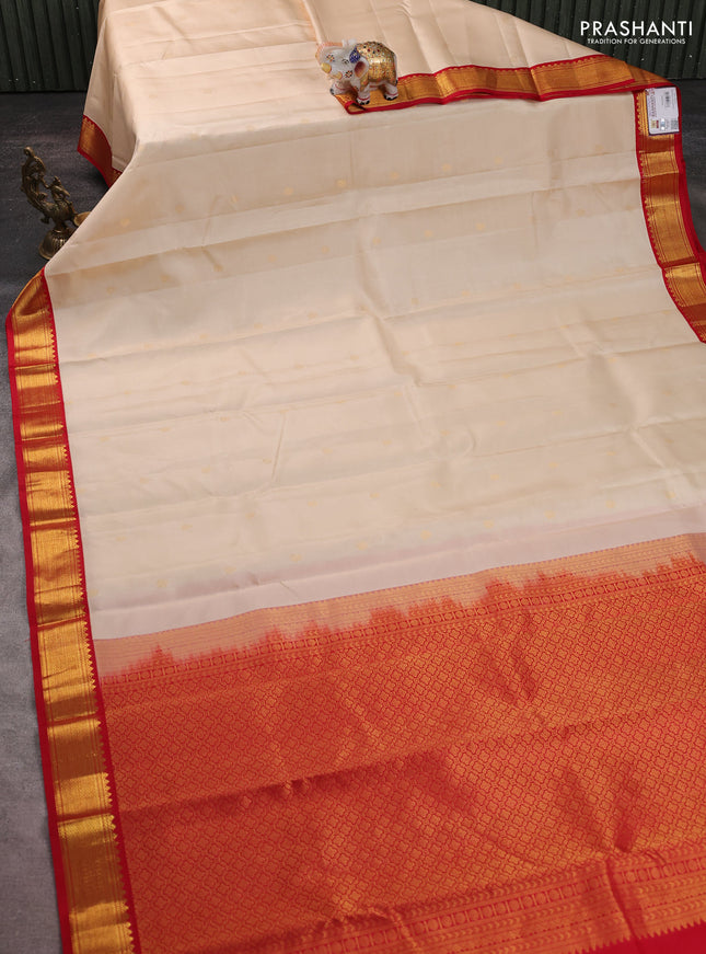 Pure kanchipuram silk saree cream and red with zari woven buttas and zari woven korvai border