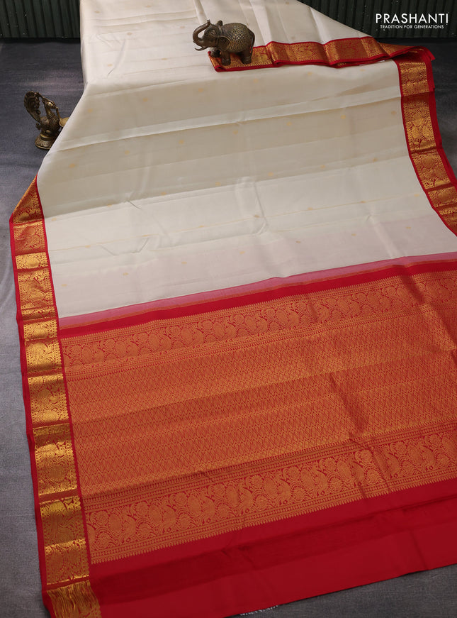 Pure kanchipuram silk saree cream and red with zari woven buttas and annam zari woven korvai border