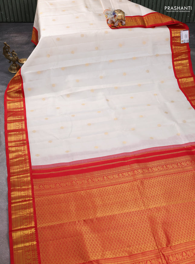 Pure kanchipuram silk saree off white and red with zari woven buttas and zari woven korvai border
