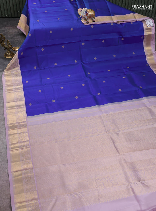 Pure kanchipuram silk saree blue and mild lavender with zari woven buttas and zari woven korvai border