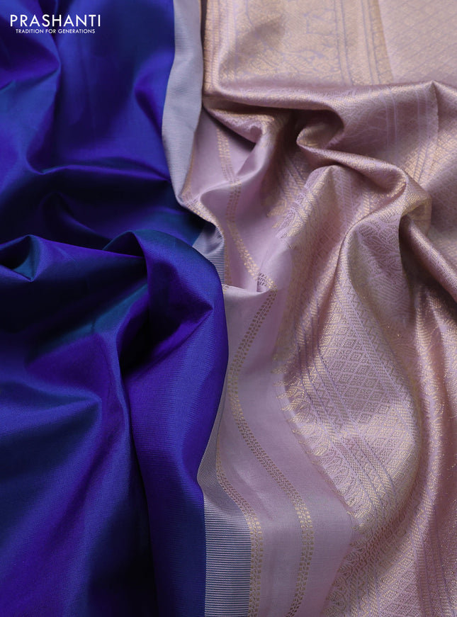 Pure kanchipuram silk saree blue and mild lavender with zari woven buttas and zari woven korvai border