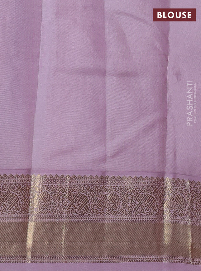Pure kanchipuram silk saree blue and mild lavender with zari woven buttas and zari woven korvai border