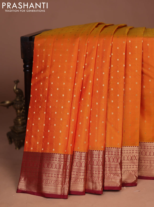 Pure kanchipuram silk saree sunset orange and maroon with allover zari woven buttas and zari woven korvai border