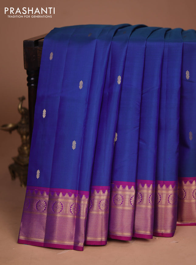 Pure kanchipuram silk saree blue and purple with zari woven buttas and temple zari woven border