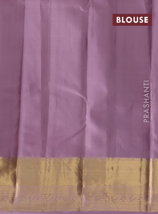 Pure kanchipuram silk saree violet with zari woven buttas and rich zari woven korvai border