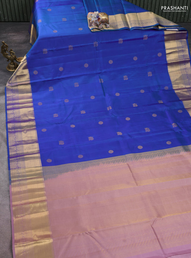 Pure kanchipuram silk saree blue and pastel pink with zari woven buttas and rich zari woven korvai border