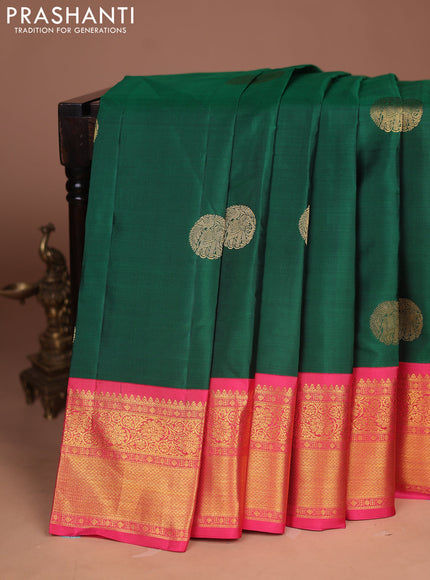 Pure kanchipuram silk saree green and peach pink with allover zari woven buttas and long zari woven border
