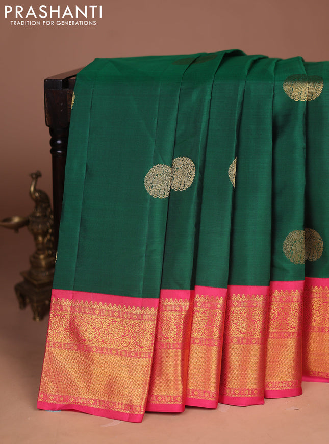 Pure kanchipuram silk saree green and peach pink with allover zari woven buttas and long zari woven border