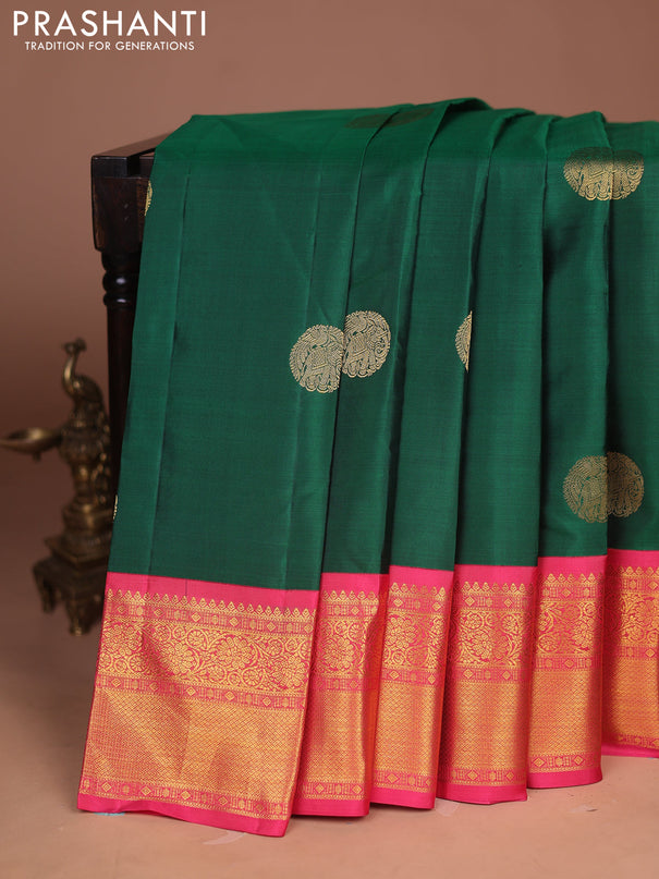 Pure kanchipuram silk saree green and peach pink with allover zari woven buttas and long zari woven border
