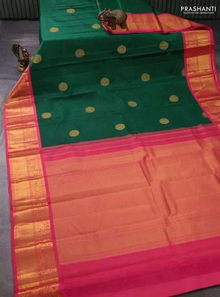 Pure kanchipuram silk saree green and peach pink with allover zari woven buttas and long zari woven border