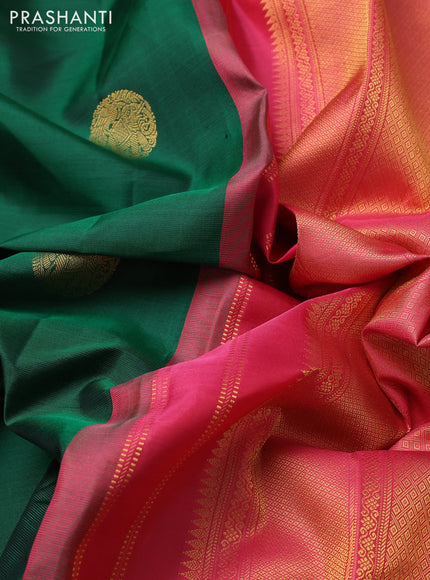 Pure kanchipuram silk saree green and peach pink with allover zari woven buttas and long zari woven border