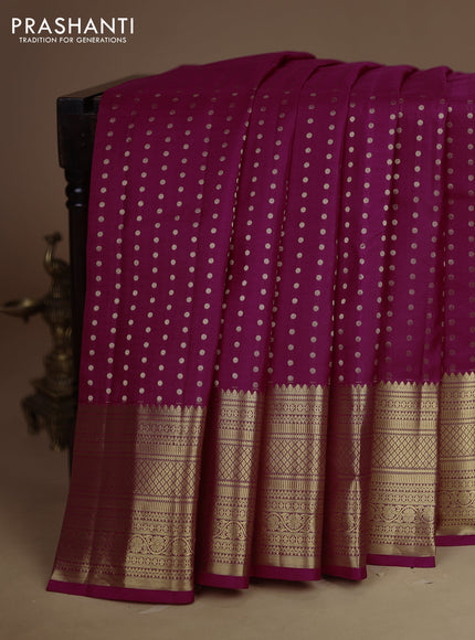 Pure kanchipuram silk saree magenta pink and green with allover zari woven buttas and long zari woven border