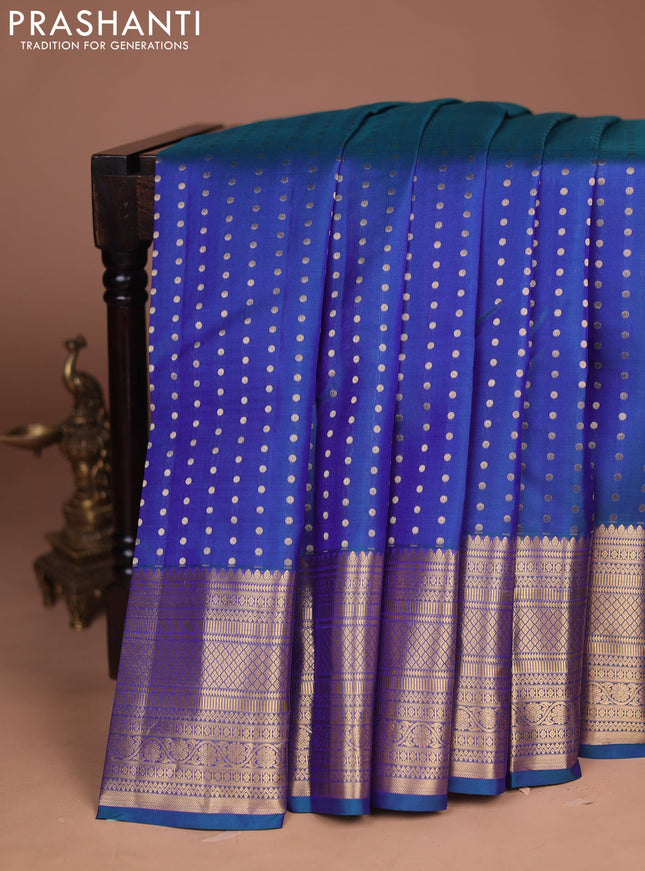 Pure kanchipuram silk saree peacock blue and red with allover zari woven buttas and long zari woven border