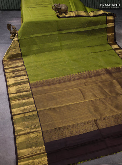 Pure kanchipuram silk saree sap green and coffee brown with allover zari weaves & buttas and zari woven korvai border