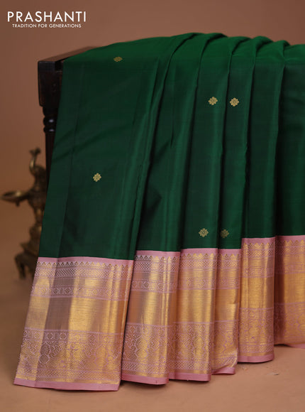 Pure kanchipuram silk saree green and peach pink with zari woven buttas and long zari woven korvai border
