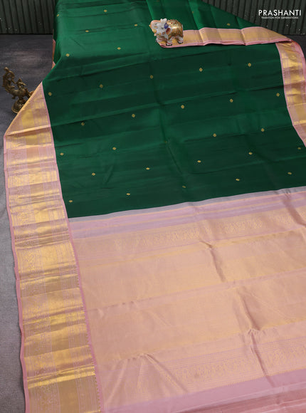 Pure kanchipuram silk saree green and peach pink with zari woven buttas and long zari woven korvai border
