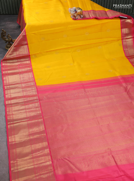 Pure kanchipuram silk saree yellow and pink with zari woven buttas and long zari woven korvai border