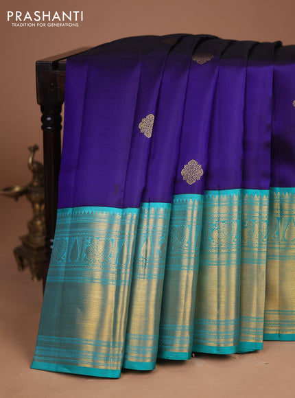 Pure kanchipuram silk saree dark blue and teal green with zari woven buttas and long zari woven korvai border