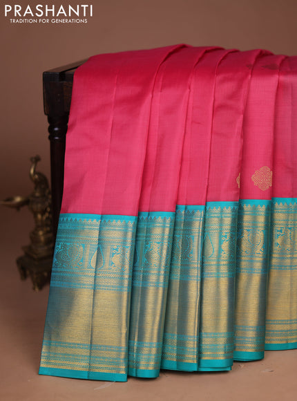 Pure kanchipuram silk saree peach pink and teal green with zari woven buttas and long zari woven korvai border