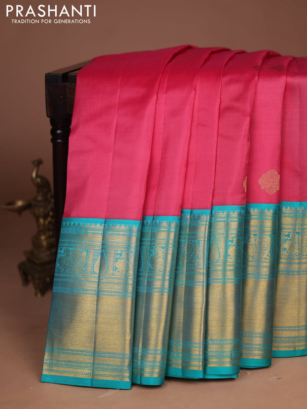 Pure kanchipuram silk saree peach pink and teal green with zari woven buttas and long zari woven korvai border