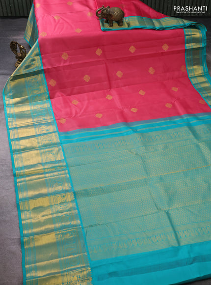 Pure kanchipuram silk saree peach pink and teal green with zari woven buttas and long zari woven korvai border