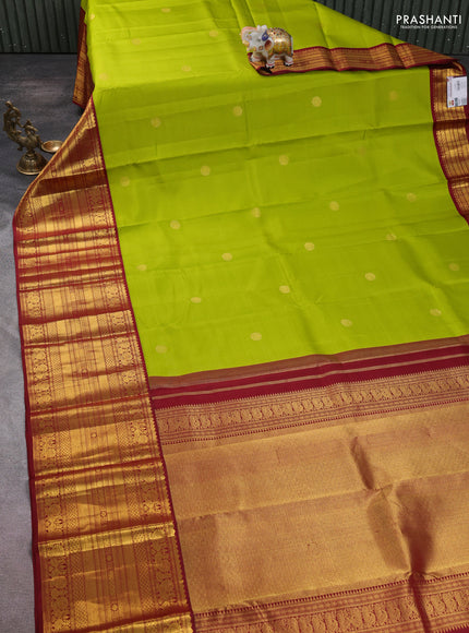 Pure kanchipuram silk saree lime green and maroon with zari woven buttas and long zari woven korvai border