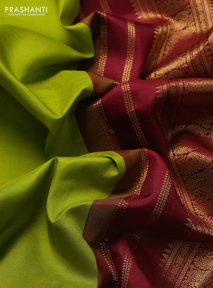 Pure kanchipuram silk saree lime green and maroon with zari woven buttas and long zari woven korvai border