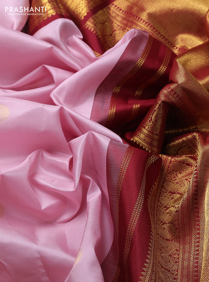 Pure kanchipuram silk saree pastel pink and maroon with zari woven buttas and long zari woven korvai border