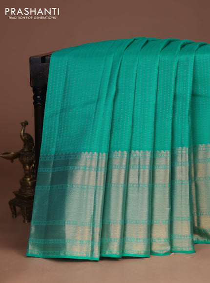 Pure kanchipuram silk saree teal green and pink with allover zari weaves and long zari woven border