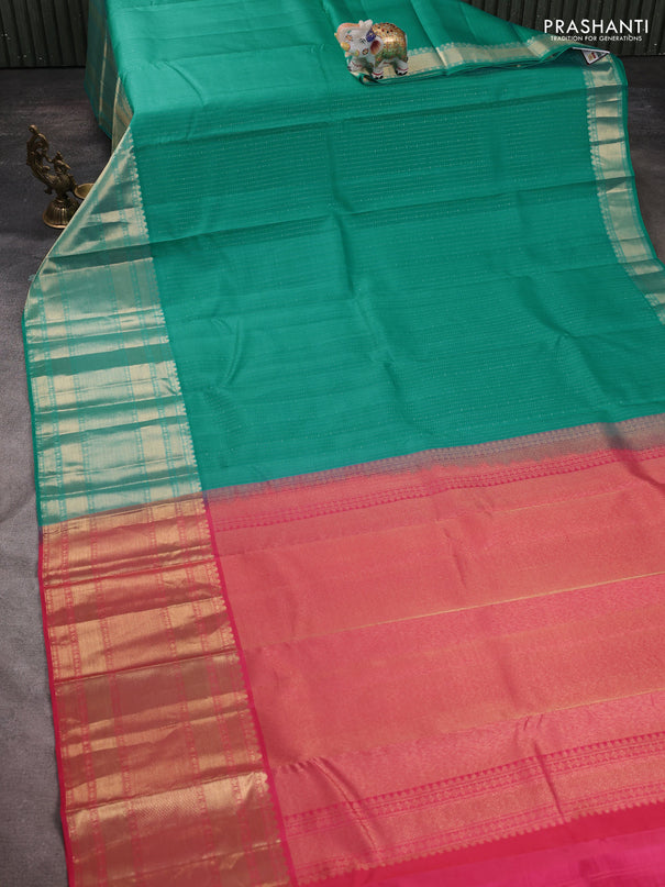 Pure kanchipuram silk saree teal green and pink with allover zari weaves and long zari woven border