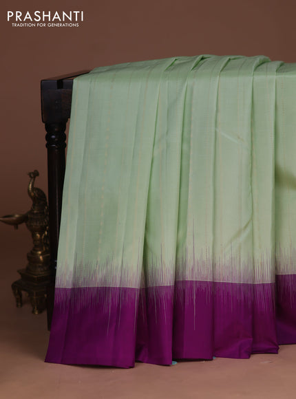 Pure kanchipuram silk saree pista green and purple with allover zari weaves and simple border