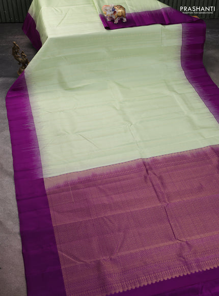 Pure kanchipuram silk saree pista green and purple with allover zari weaves and simple border