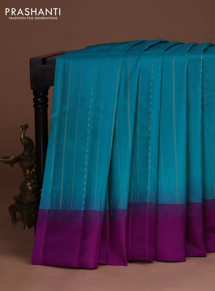 Pure kanchipuram silk saree teal blue and purple with allover zari weaves and simple border