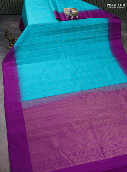 Pure kanchipuram silk saree teal blue and purple with allover zari weaves and simple border