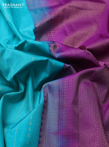 Pure kanchipuram silk saree teal blue and purple with allover zari weaves and simple border