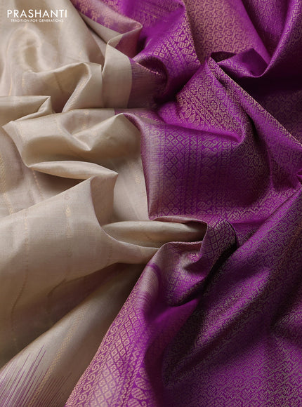 Pure kanchipuram silk saree beige and purple with allover zari weaves and simple border