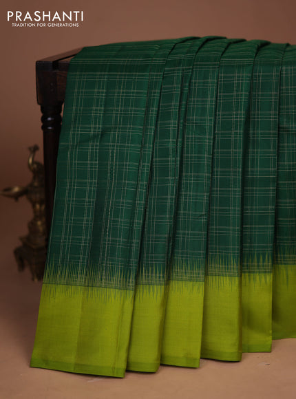 Pure kanchipuram silk saree green and light green with allover zari checked pattern and simple border