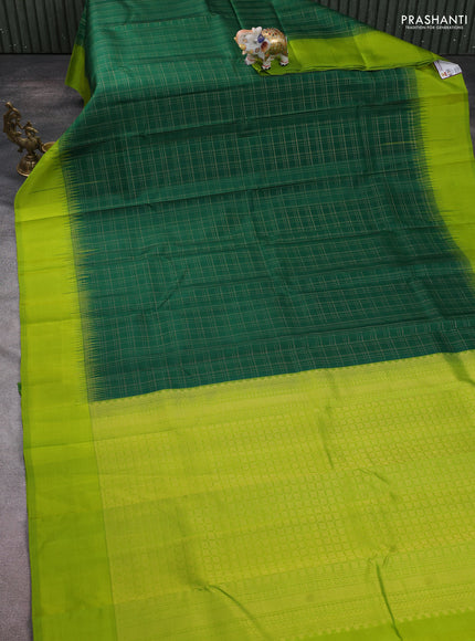 Pure kanchipuram silk saree green and light green with allover zari checked pattern and simple border