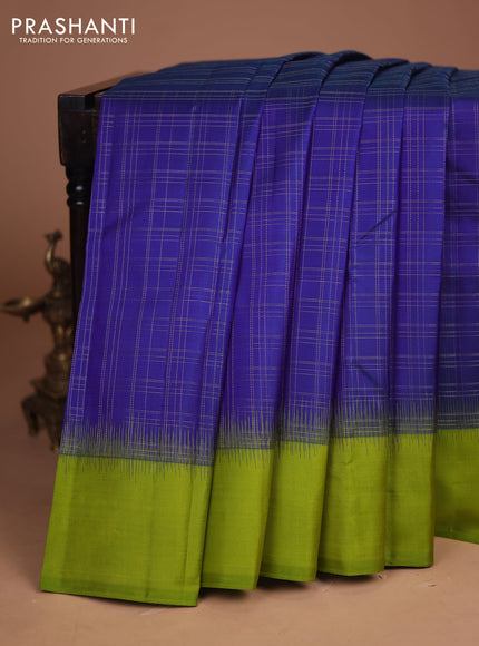 Pure kanchipuram silk saree blue and light green with allover zari checked pattern and simple border