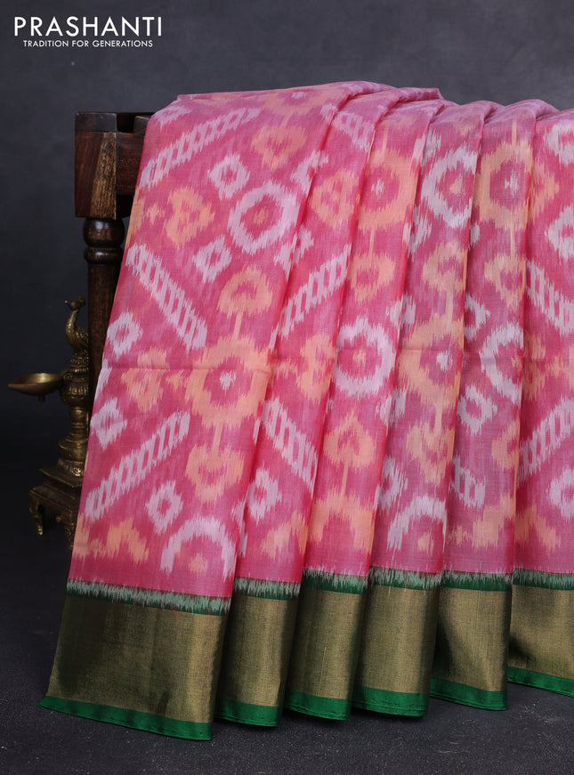 Ikat silk cotton saree pink shade and green with allover ikat weaves and zari woven border