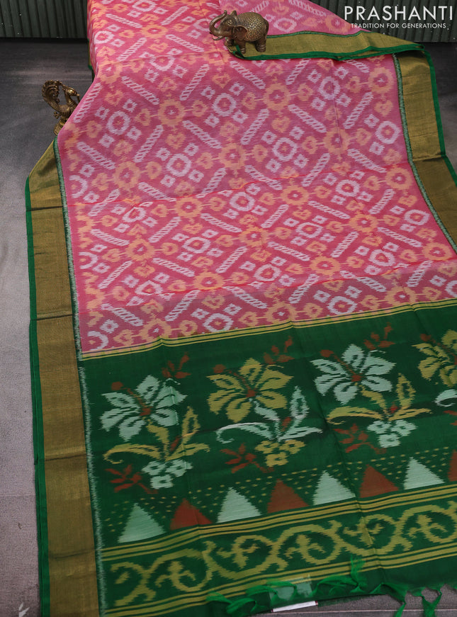 Ikat silk cotton saree pink shade and green with allover ikat weaves and zari woven border