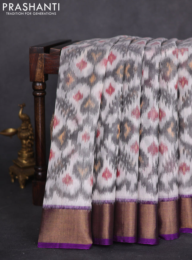 Ikat silk cotton saree off white and purple with allover ikat weaves and zari woven border