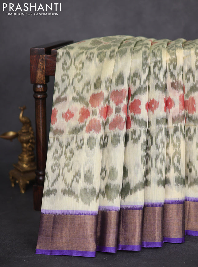 Ikat silk cotton saree cream and blue with allover ikat weaves and zari woven border
