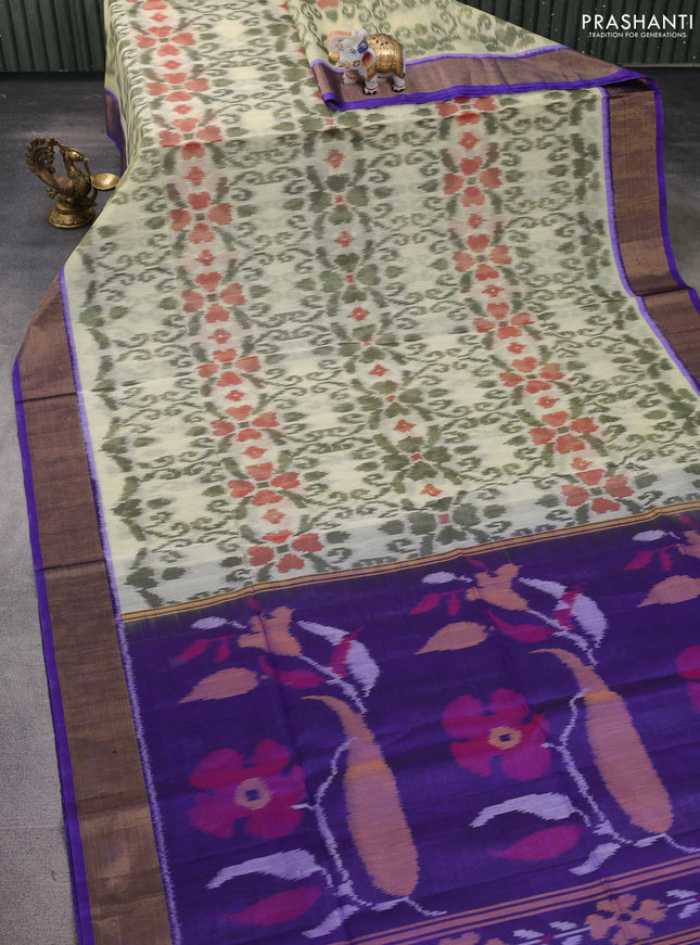 Ikat silk cotton saree cream and blue with allover ikat weaves and zari woven border