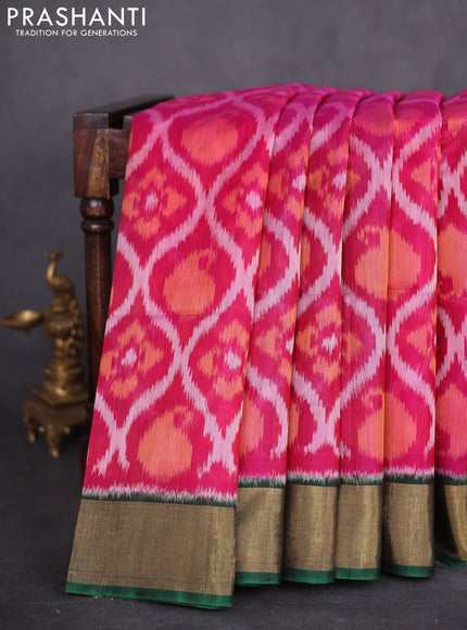 Ikat silk cotton saree pink and bottle green with allover ikat weaves and zari woven border
