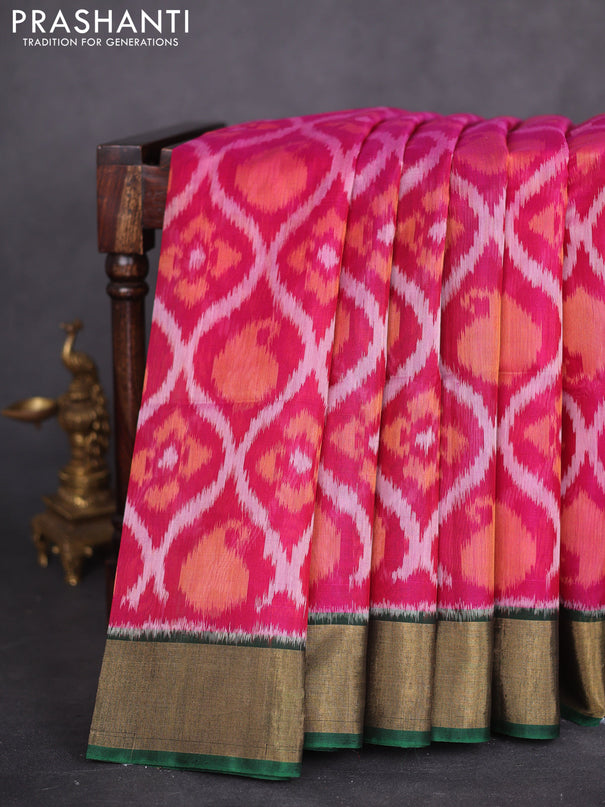 Ikat silk cotton saree pink and bottle green with allover ikat weaves and zari woven border