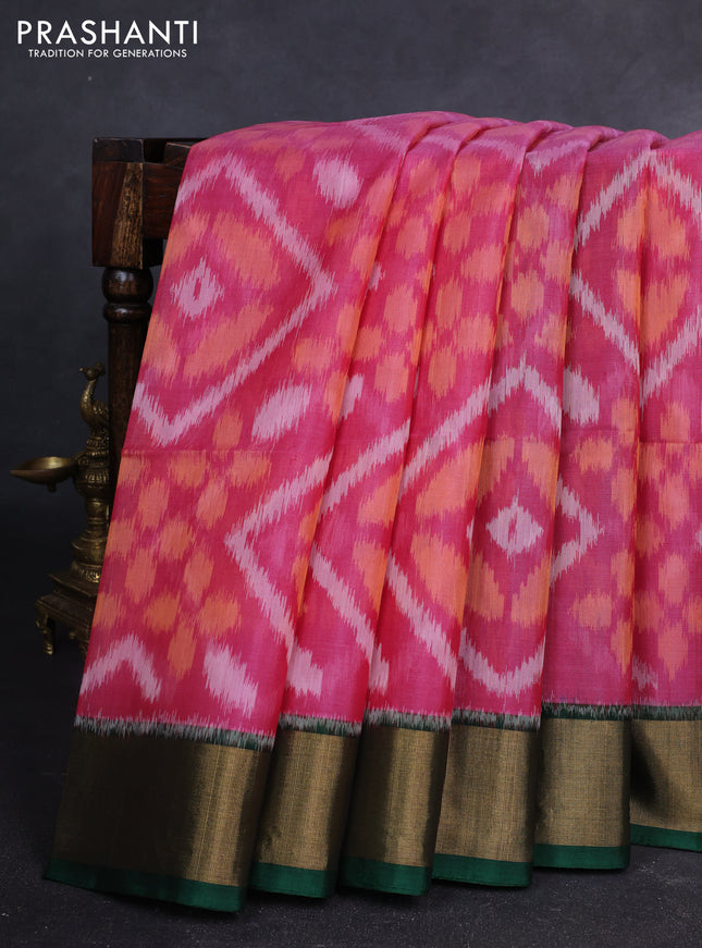 Ikat silk cotton saree pink and green with allover ikat weaves and zari woven border