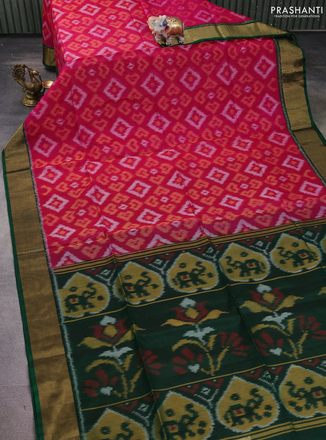 Ikat silk cotton saree magenta pink and bottle green with allover ikat weaves and zari woven border