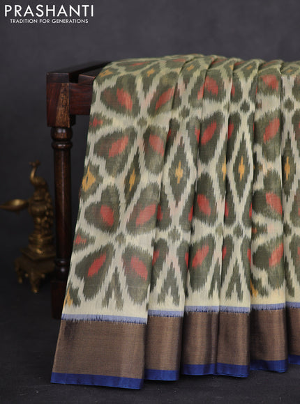 Ikat silk cotton saree cream sap green and peacock blue with allover ikat weaves and zari woven border