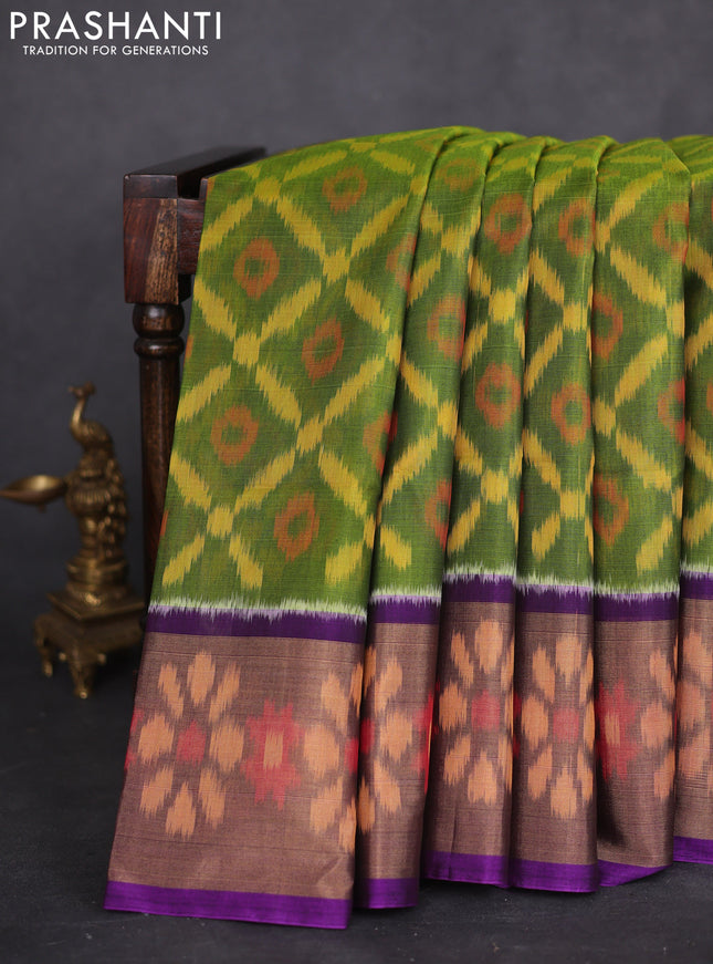 Ikat silk cotton saree green and purple with allover ikat weaves and long zari woven ikat border